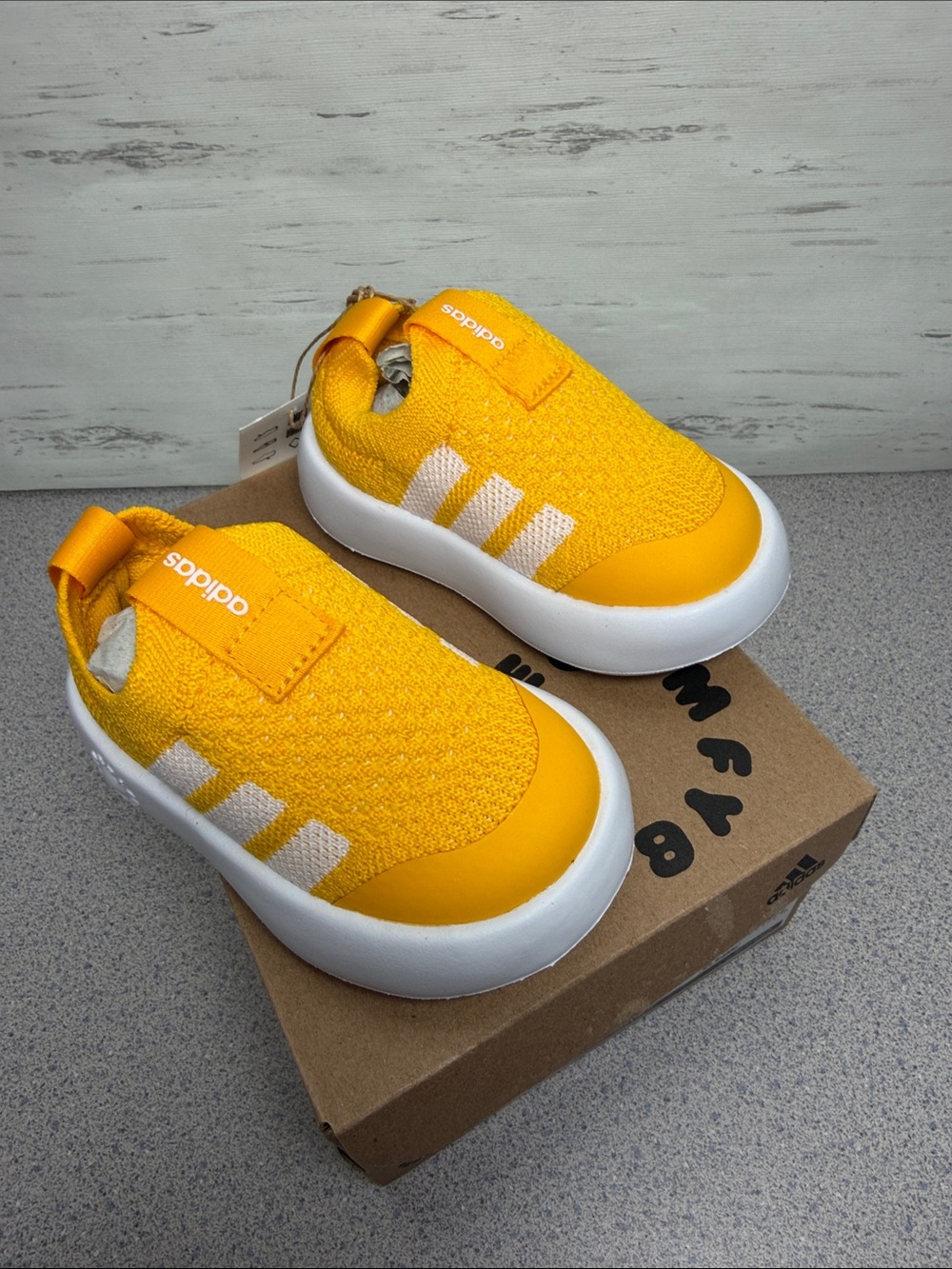 adidas Kids Bright Yellow Slip-On Knit Sneakers with White Stripes